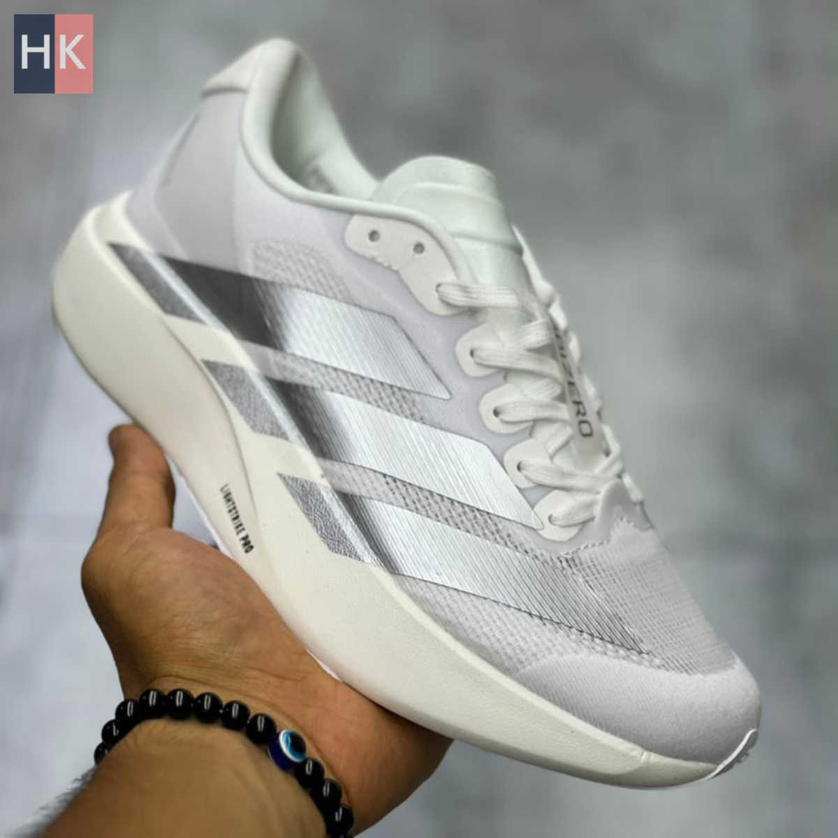کتونی آدیداس آدیزیرو ایوو اس ال سفید و نقره ای ( Adidas Adizero EVO SL ) کتونی آدیداس آدیزیرو ایوو اس ال سفید و نقره ای ( Adidas Adizero EVO SL )